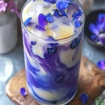 Vibrant Iced Butterfly Pea Flower Tea Latte for Refreshing Bliss 6 Iced Butterfly Pea Flower Tea Latte
